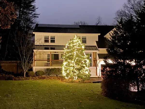 Roofline and landscape lighting on a home in Burlington, MA