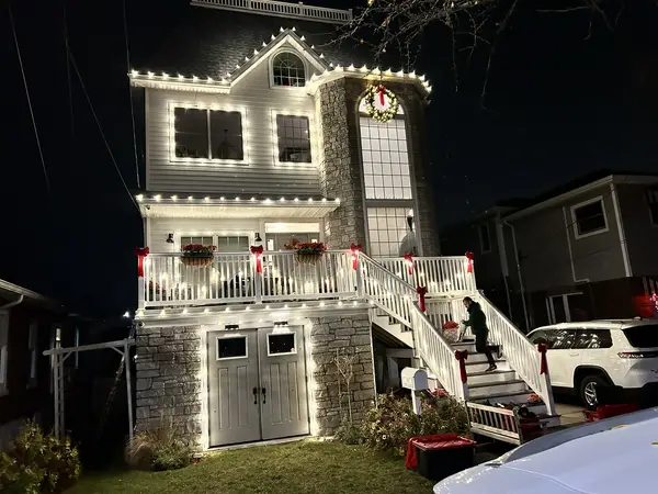 Roofline and landscape lighting on a home in New York, NY