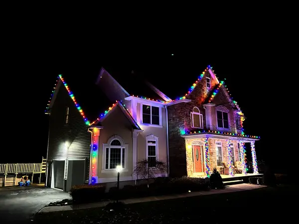Roofline and landscape lighting on a home in Town of Fishkill, NY