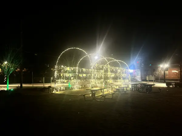 Municipal holiday lighting on a town center building installed by the Holiday Lights Decor network
